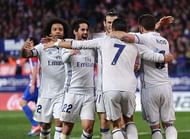 MADRID, SPAIN - NOVEMBER 19:  Cristiano Ronaldo of Real Madrid celebrates with teammates after scoring Real's 3rd goal during the La Liga match between Club Atletico de Madrid and Real Madrid CF at Vicente Calderon Stadium on November 19, 2016 in Madrid, Spain.  (Photo by Denis Doyle/Getty Images)